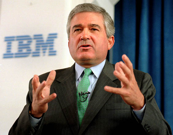 IBM Chairman and CEO Louis V. Gerstner gestures during a news conference in New York Monday, June 5, 1995. Lotus Development Corp. agreed to be brought out by IBM on Sunday, June 11, 1995, after the two companies arrived at a $64 per share price, $4 higher than what IBM offered when it began the hostile takeover attempt. The deal, valued at $3.52 billion, is the software industry's largest merger.  (AP Photo/Kathy Willens)