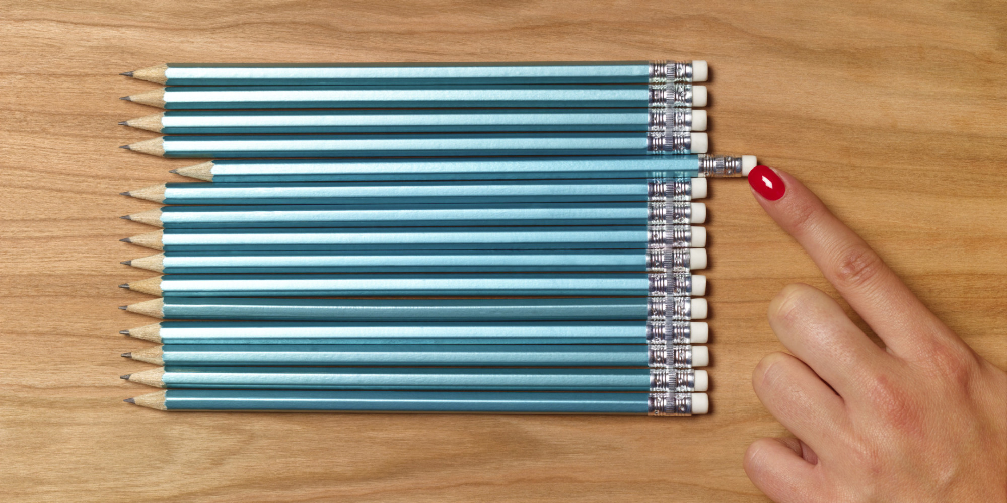 Teacher preparing pencils for school day